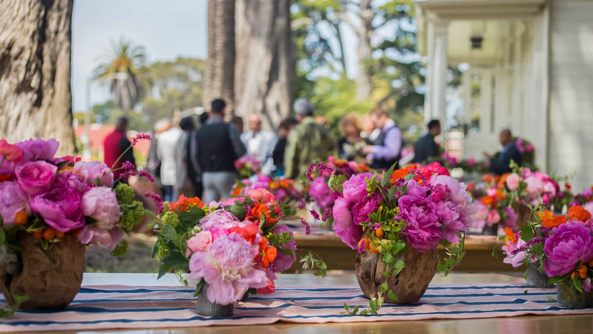 Colorful Wedding Flowers And Mingling Guests At A Micro Wedding At The Funston House